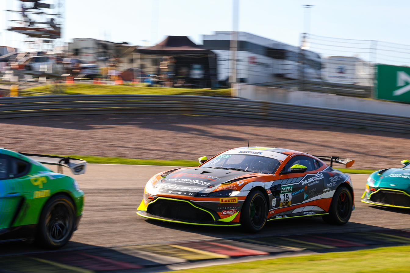 Aston Martin Vantage GT4 number 19 at speed on track